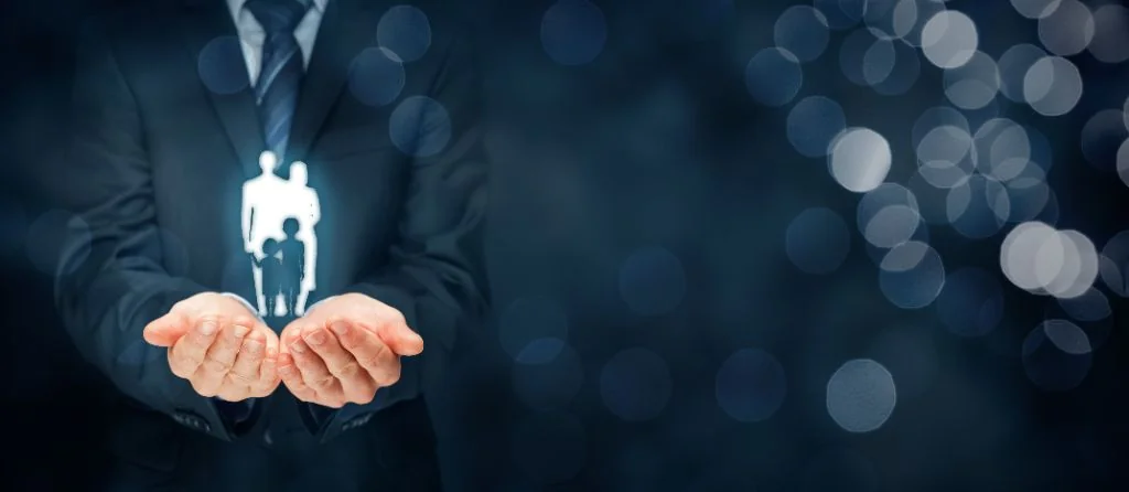 Professional insurance advisor protecting family - life insurance coverage concept